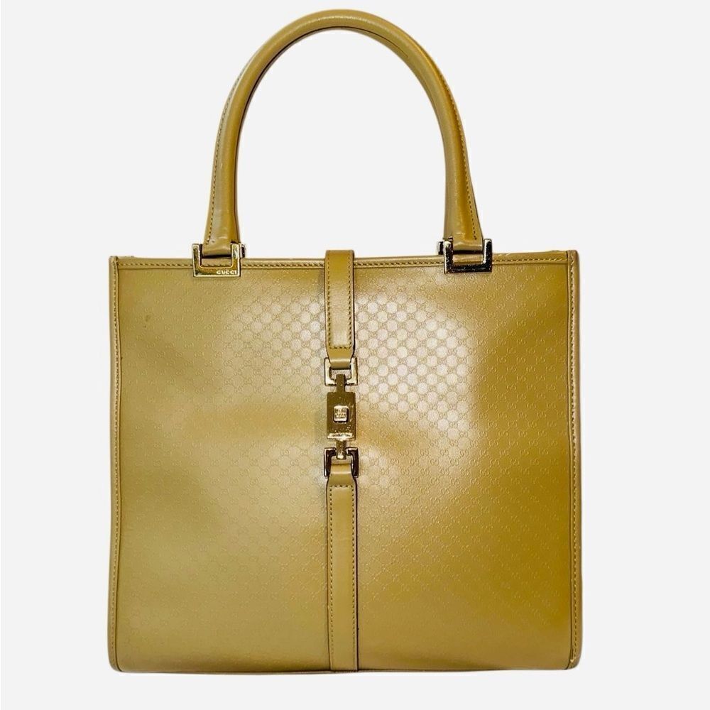 Gucci Jackie bag with piston lock